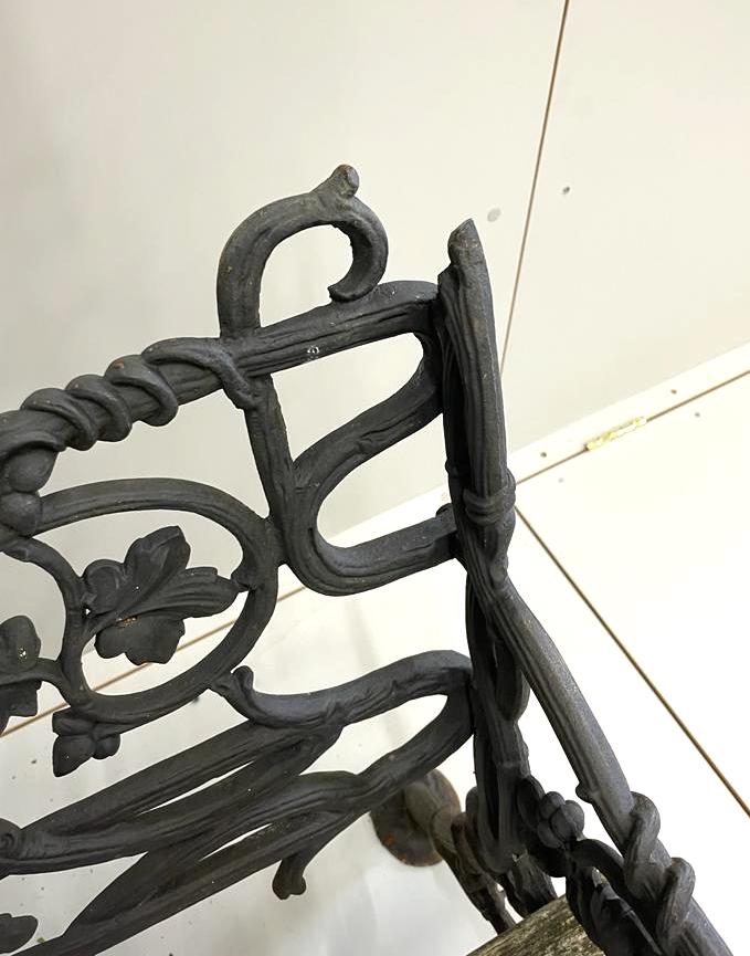 A Victorian possibly Coalbrookdale cast iron ivy pattern garden bench, length 147cm, depth 52cm, height 89cm